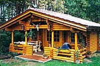 Holzhaus-Rundbohlen-Rundbalken-Ferienhaus-planung-14