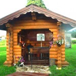 Holzhaus-Rundbohlen-Rundbalken-Gartenhaus-rb16