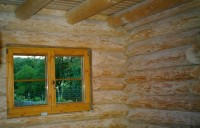 Holzhaus-Rundbohlen-Rundbalken-Naturstammhaus-n16