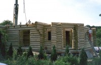 Holzhaus-Rundbohlen-Rundbalken-Naturstammhaus-n9